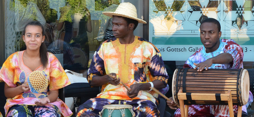 Musicians playing traditional African percussion instruments